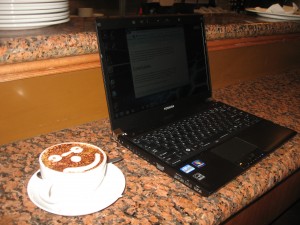 Toshiba Portege R830 ultraportable on coffee bar at a cafe