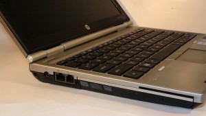 HP Elitebook 2560p business notebook left-hand side connections - power, Ethernet, modem, DVD burner, smart-card reader 
