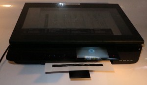 Envy 120 designer all-in-one printer printing a document