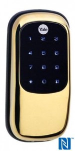 Yale Real Living NFC-capable smart deadbolt - outside view (brass finish) press picture courtesy of Yale America