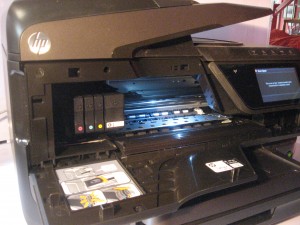 HP OfficeJet Pro 8600a Plus all-in-one printer illuminated mechanism bay
