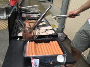 Democracy sausages prepared at election day sausage sizzle